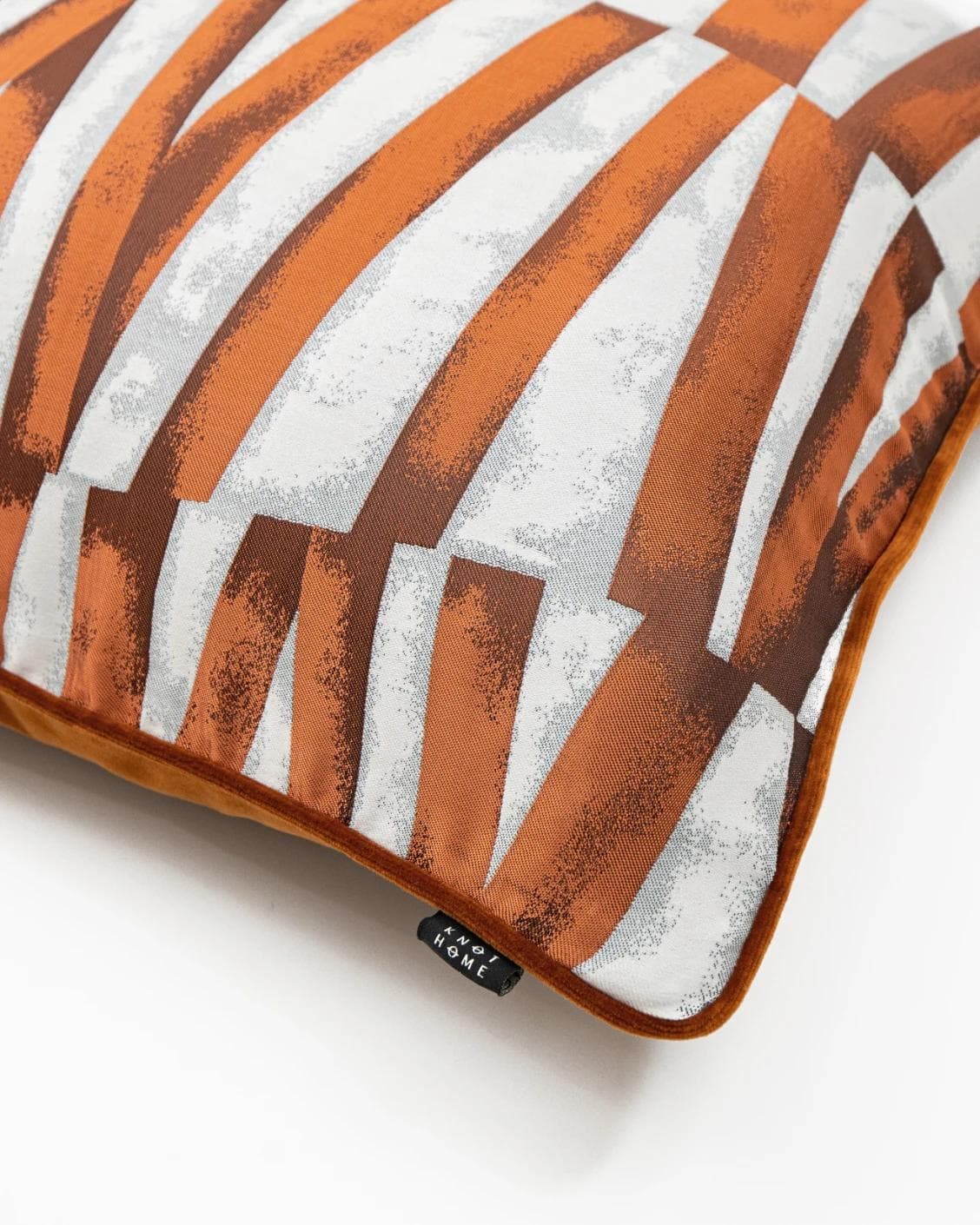 Carlie Hodler cushion in orange and white, shown in a product close-up as image 6