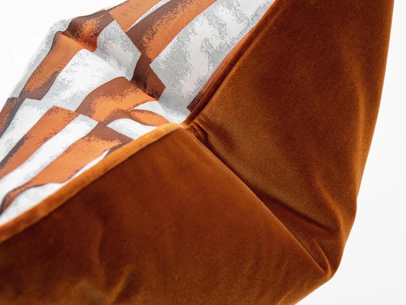 Carlie Hodler cushion in orange and white, shown in a product close-up as image 7