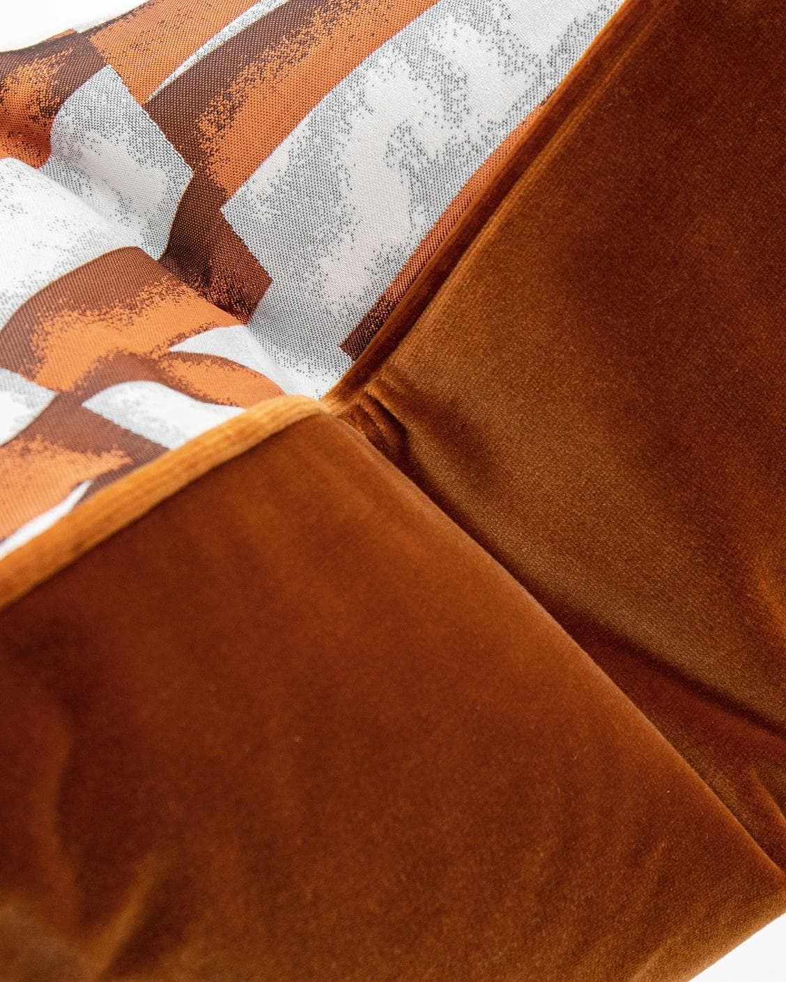 Carlie Hodler cushion in orange and white, shown in a product close-up as image 7