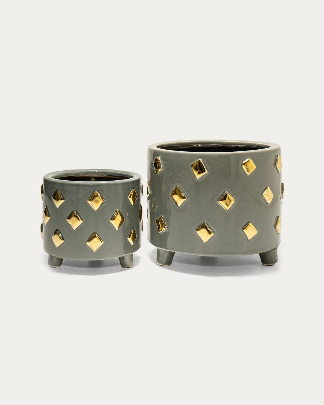 Caspian Arneson Bundle vases in grey and gold, shown in a product front view as image 1