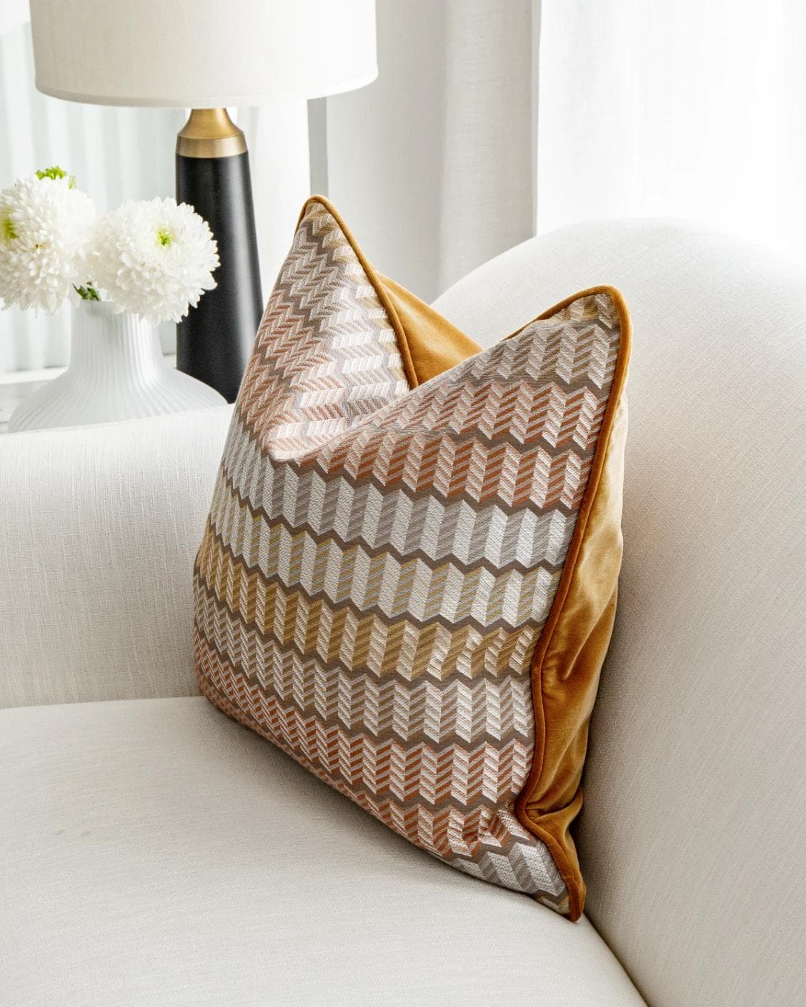 Cecilia Hodler cushion in orange, yellow and multicolour, shown in a lifestyle right view as image 5