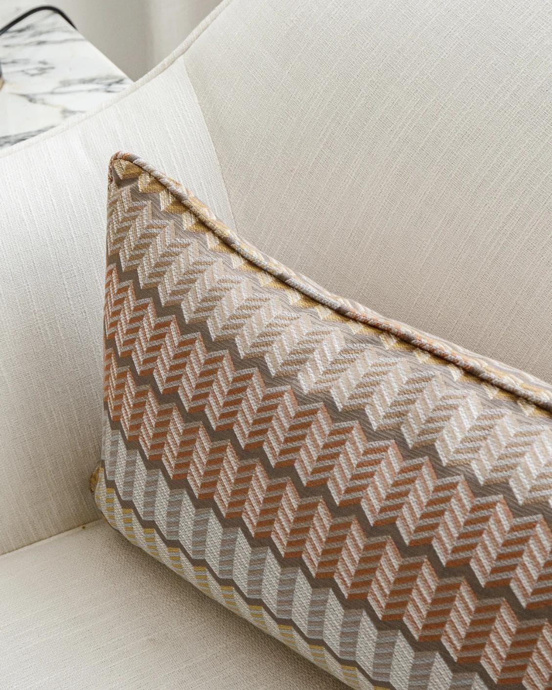 Cecilia Hodler II cushion in orange, yellow and multicolour, shown in a lifestyle top view as image 5