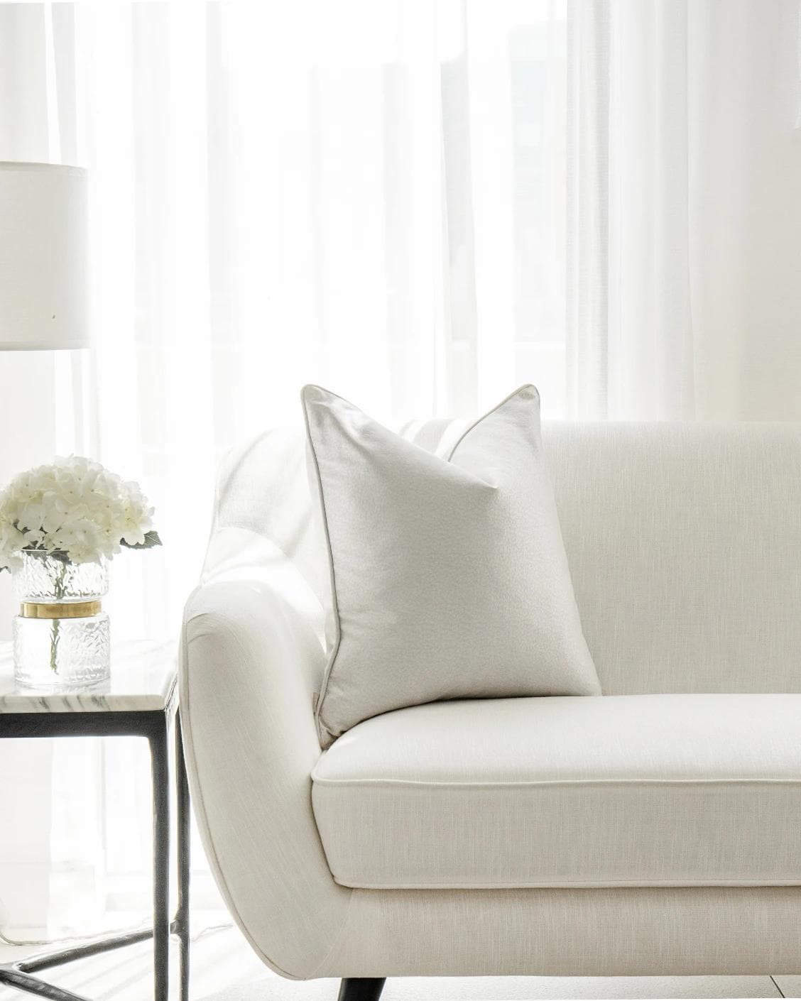 Celeste Hodler cushion in silver, shown in a lifestyle front view as image 4
