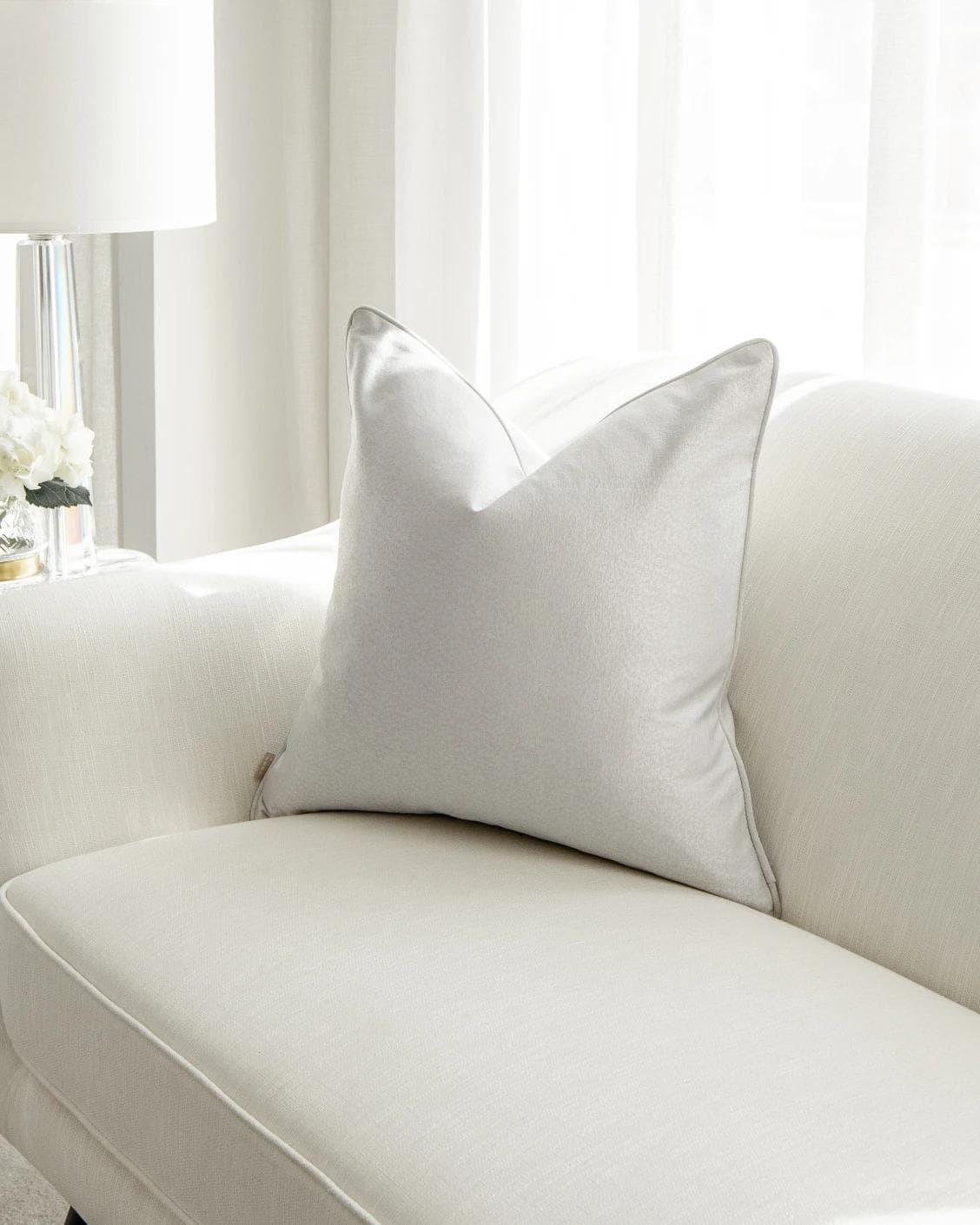 Celeste Hodler cushion in silver, shown in a lifestyle front view as image 5