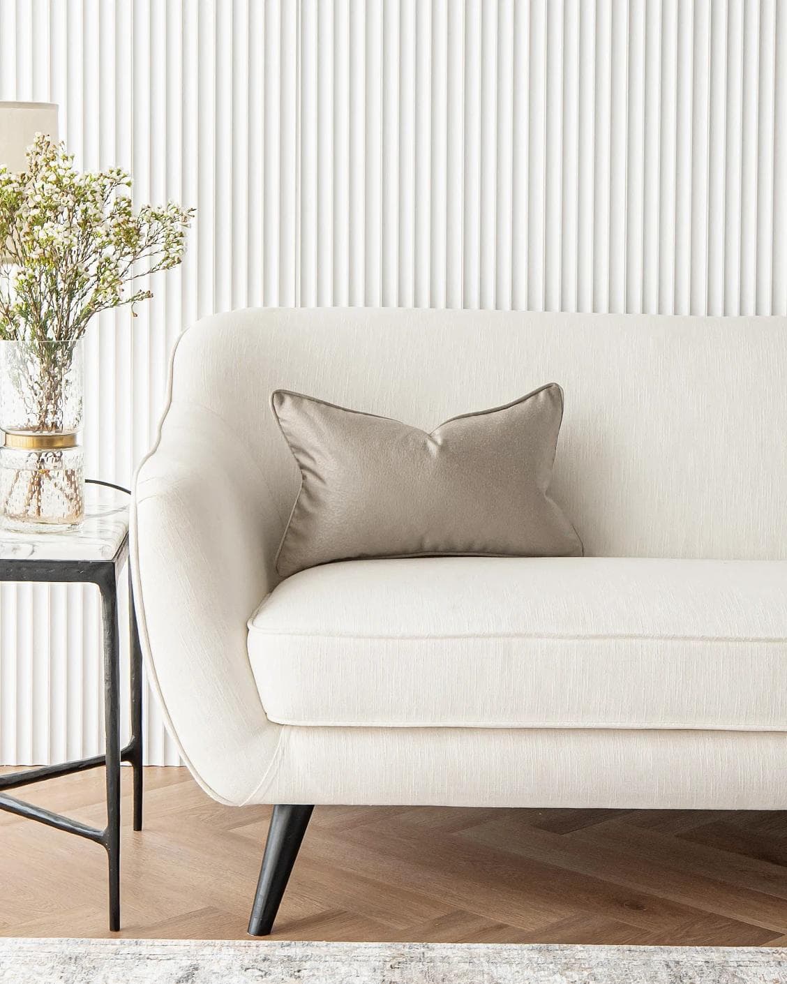 Celeste Laurent II cushion in gold and beige, shown in a lifestyle front view as image 4