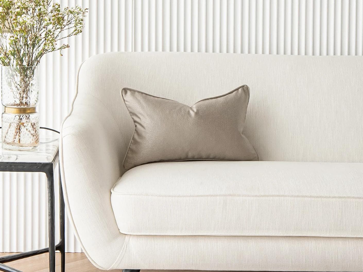 Celeste Laurent II cushion in gold and beige, shown in a lifestyle front view as image 4