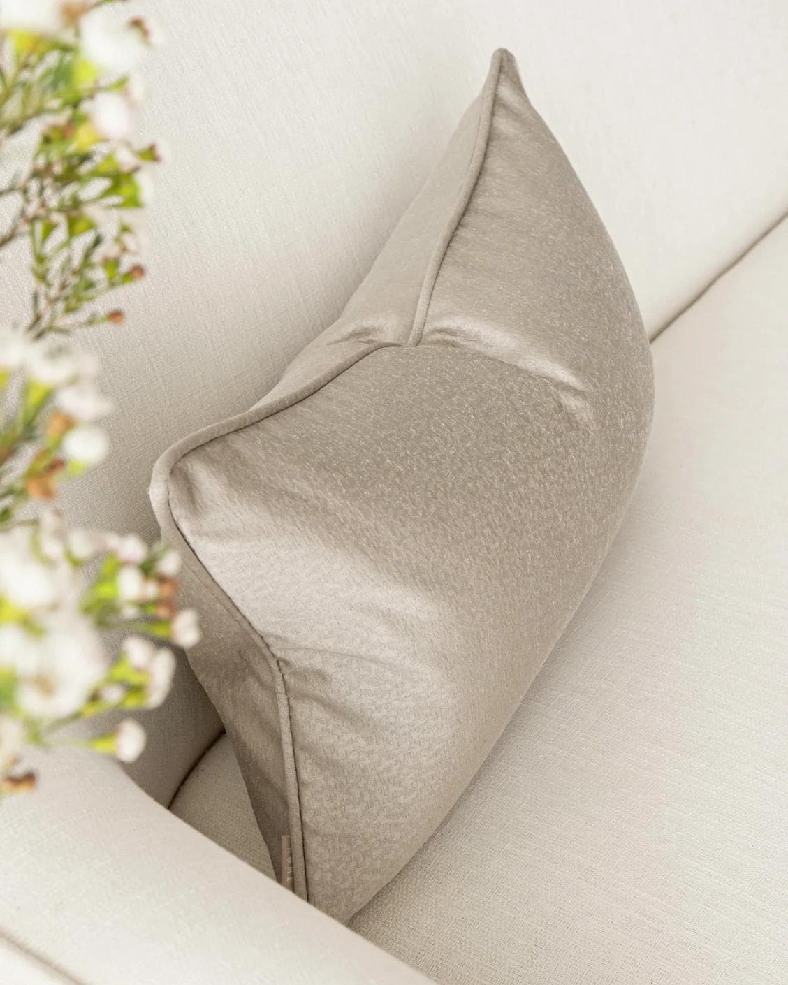 Celeste Laurent II cushion in gold and beige, shown in a lifestyle top view as image 6