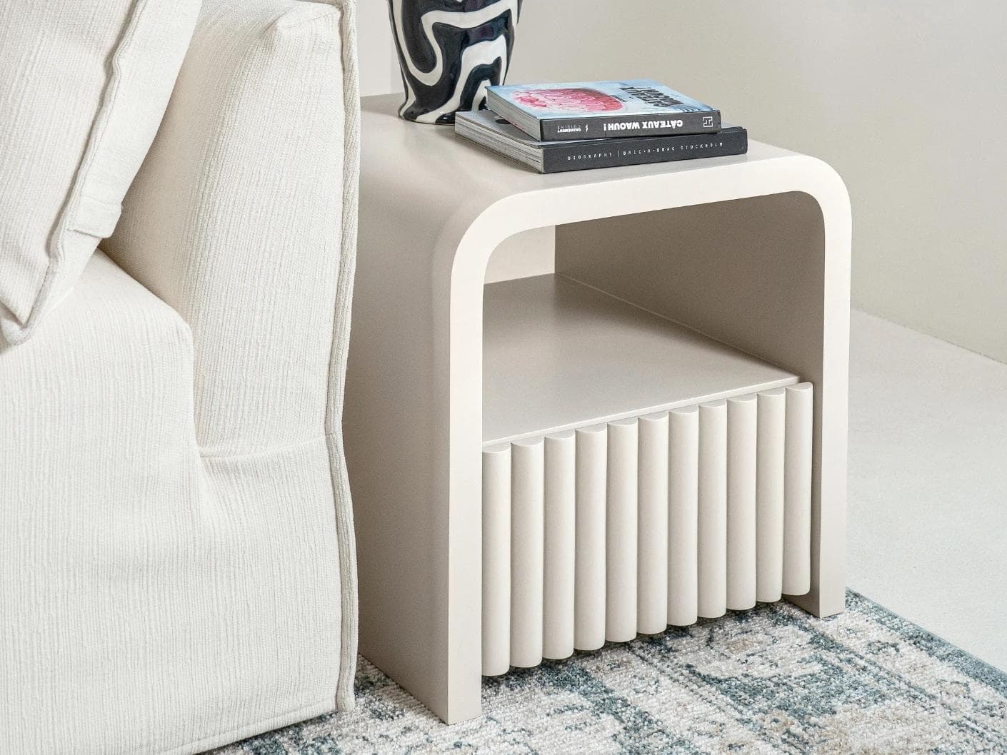 Celia nightstand in soft ivory and stone, shown in a lifestyle left view as image 5