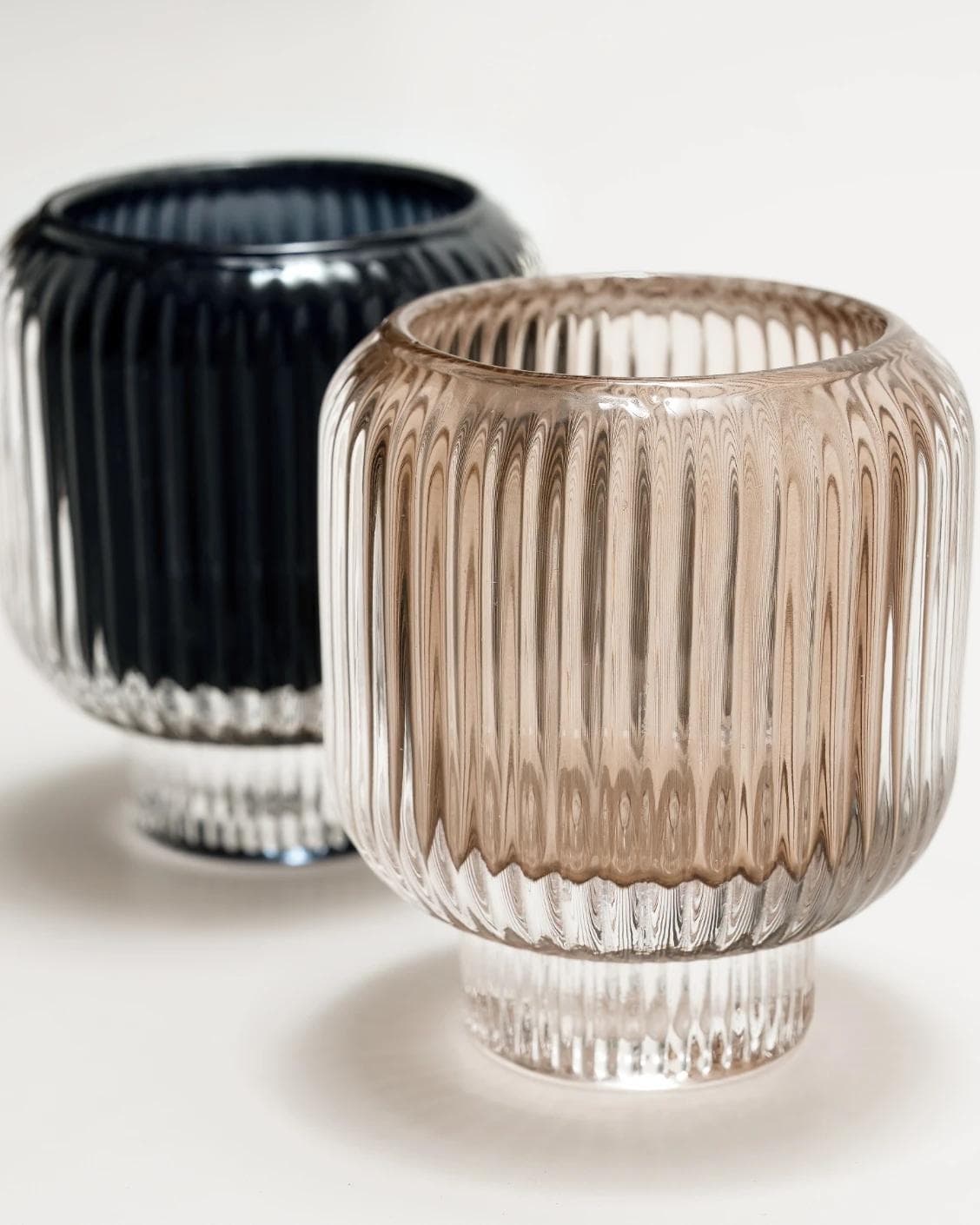 Chandelle Storms candle holders in black and taupe, shown in a product close-up as image 6