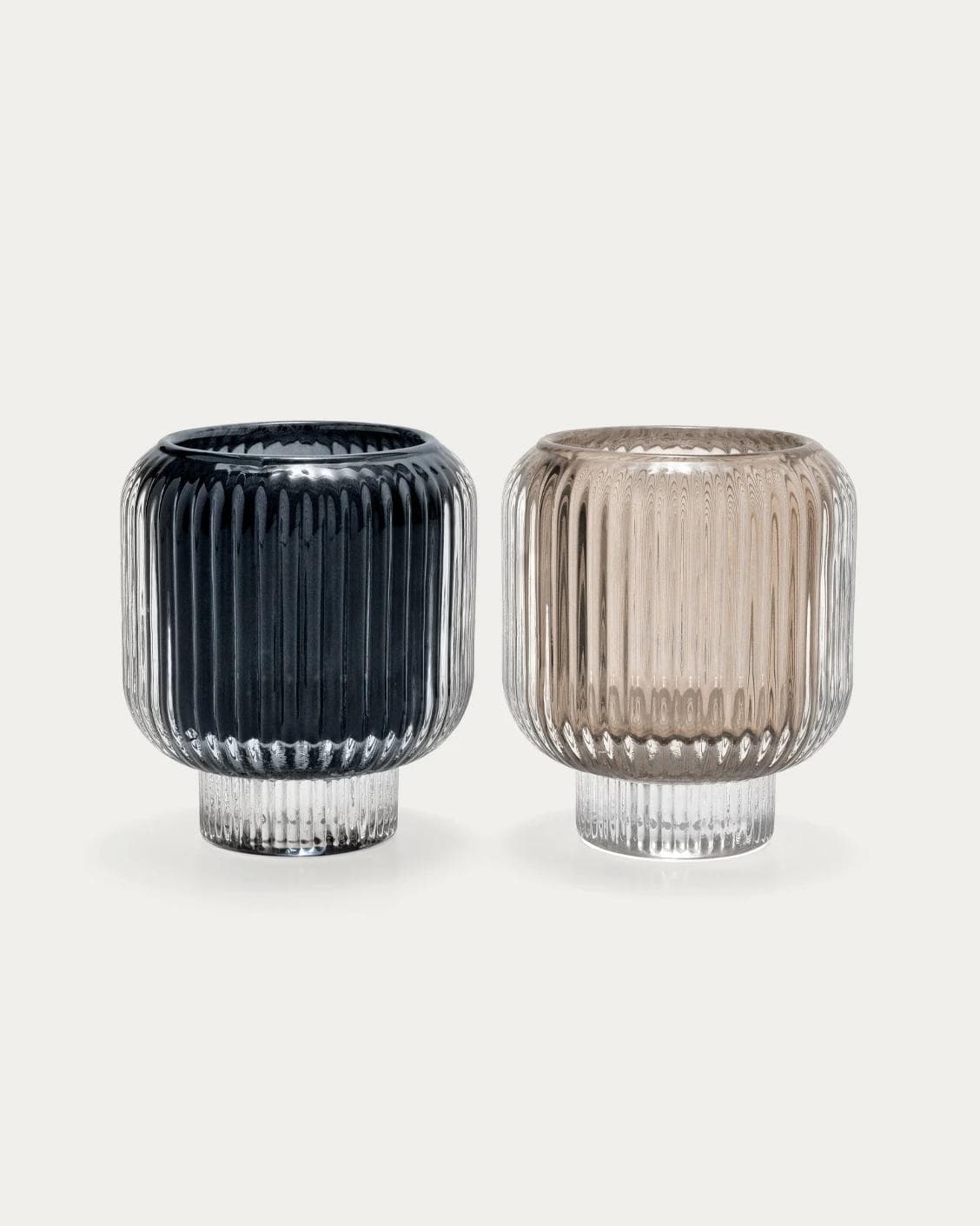 Chandelle Storms candle holders in black and taupe, shown in a product front view as image 1