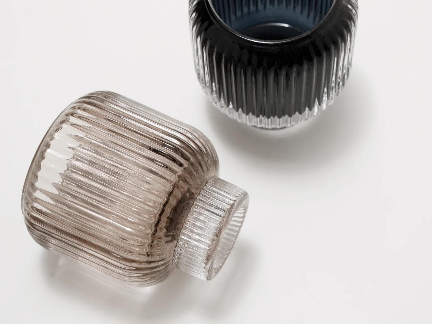 Chandelle Storms candle holders in black and taupe, shown in a product top view as image 8