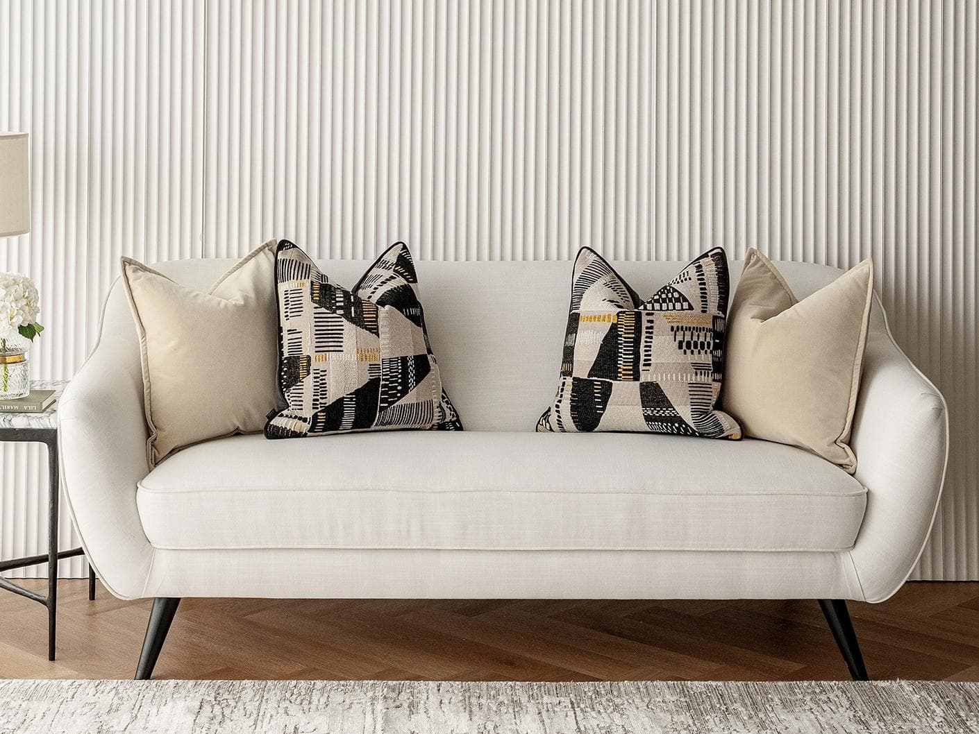 Charna Bundle cushion in beige, shown in a lifestyle front view as image 4