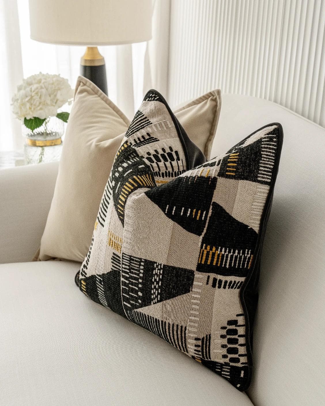 Charna Bundle cushion in beige, shown in a lifestyle right view as image 5