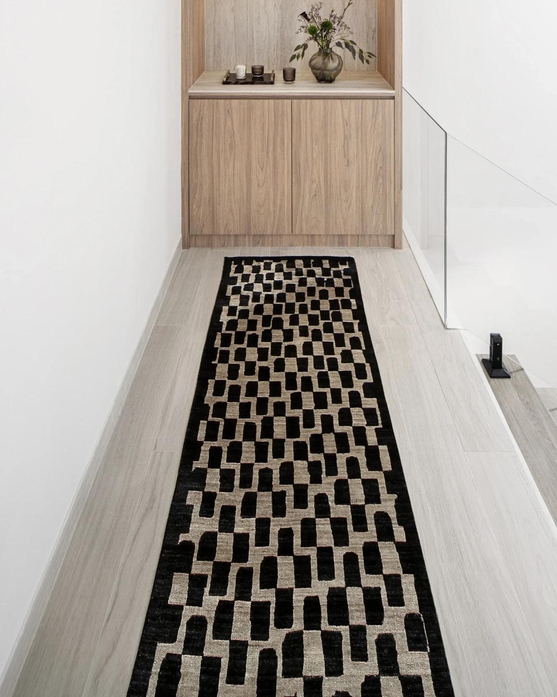 Chess Ebony Runners carpet in beige and black, shown in a lifestyle front view as image 2