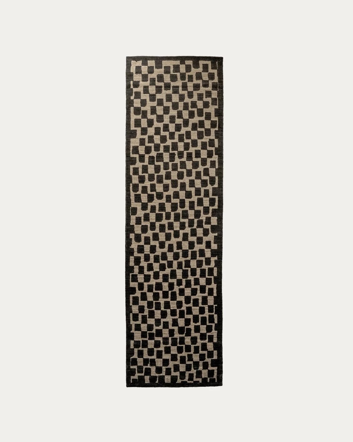 Chess Ebony carpets in beige and black, shown in a product top view as image 1