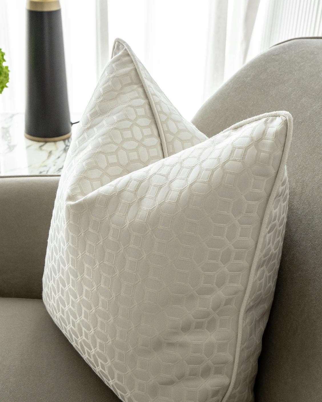 Cillian Bianca cushion in white, shown in a lifestyle right view as image 6