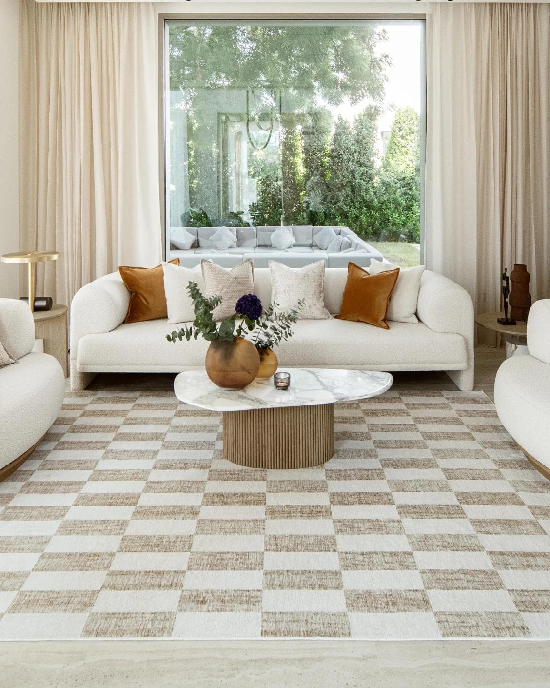 Cindy Tan Round carpet in taupe and beige, shown in a lifestyle front view as image 4
