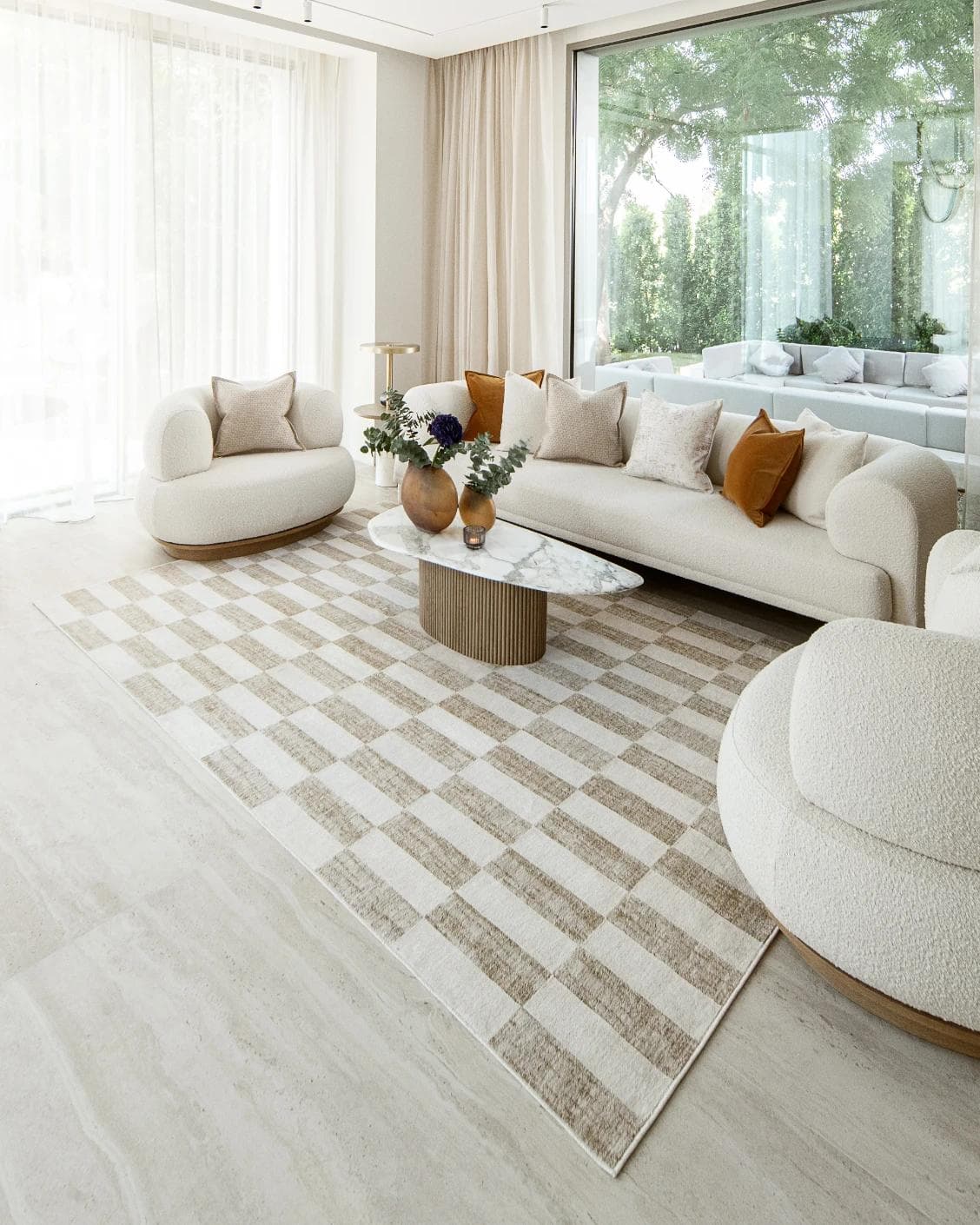 Cindy Tan Round carpet in taupe and beige, shown in a lifestyle right view as image 6