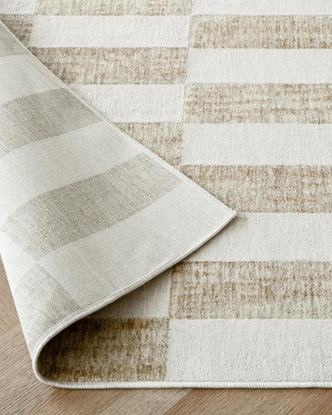 Cindy Tan Round carpet in taupe and beige, shown in a product close-up as image 8