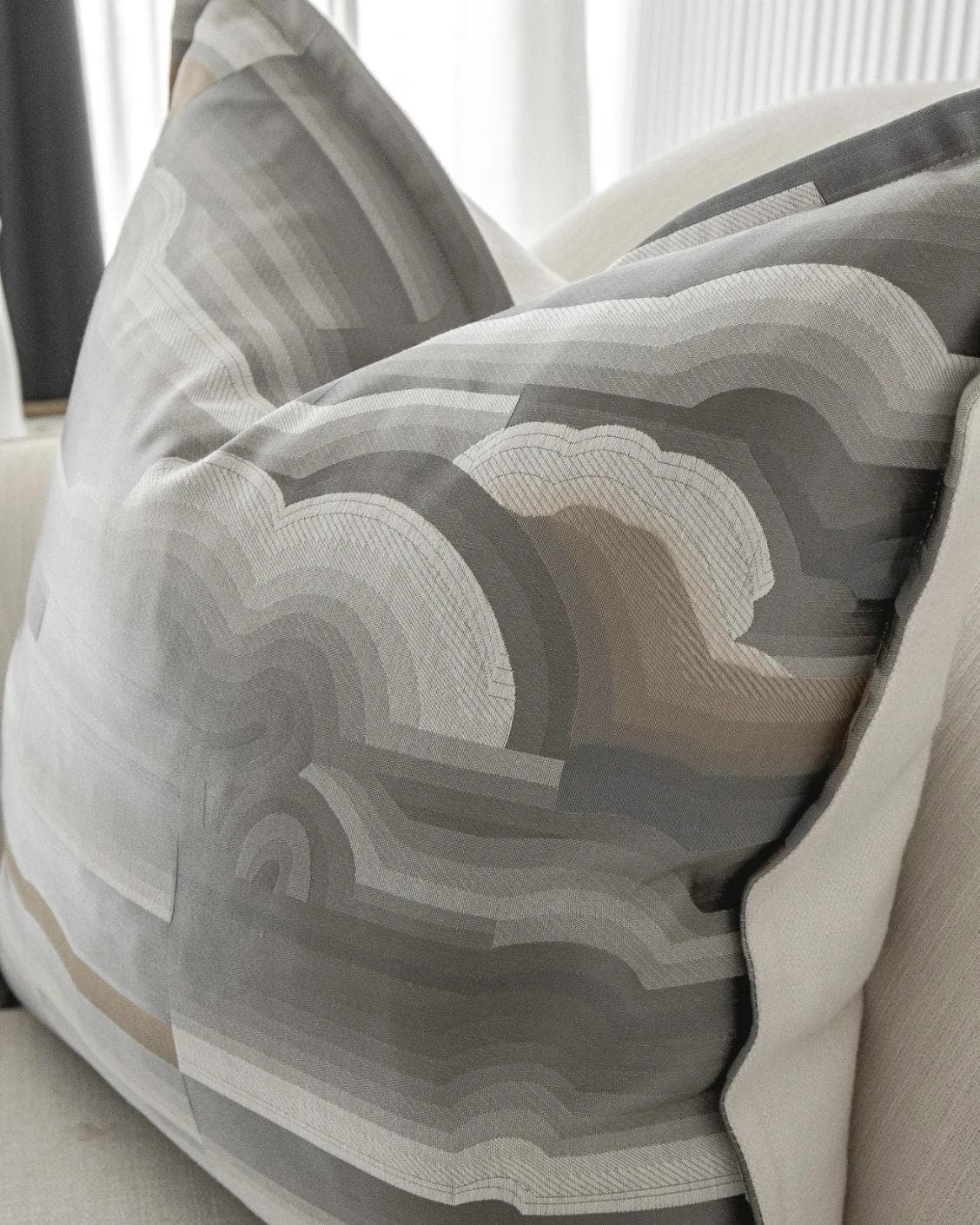 Claudine Laurent cushion in grey, shown in a lifestyle right view as image 5