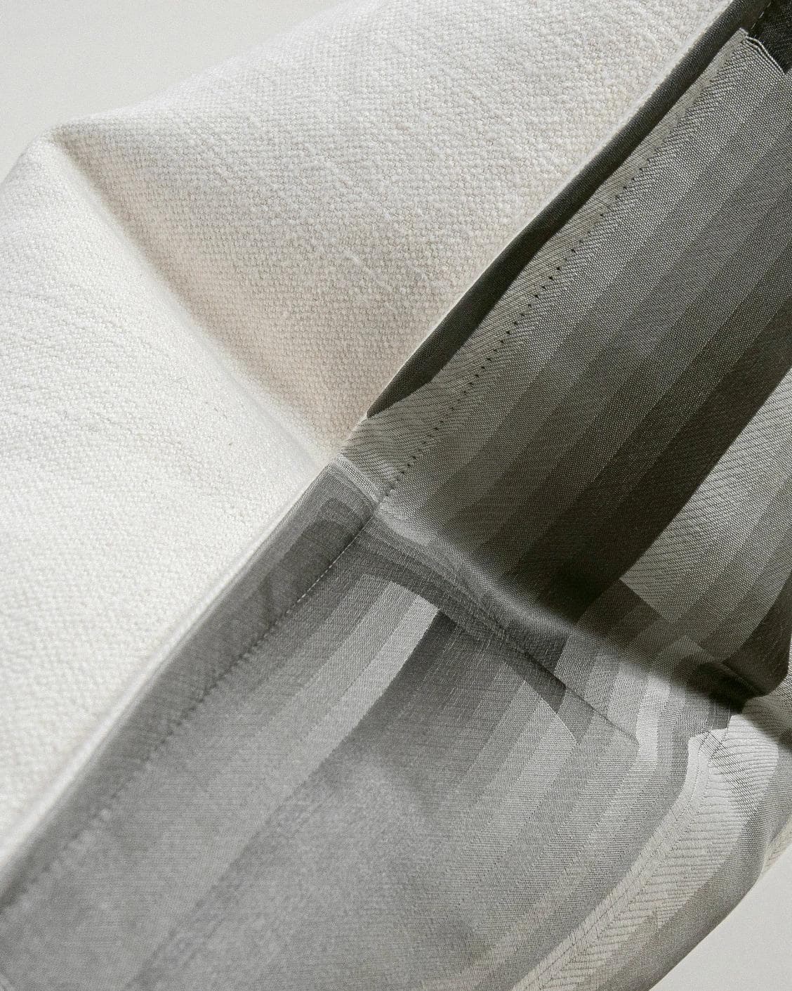 Claudine Laurent cushion in grey, shown in a product close-up as image 6