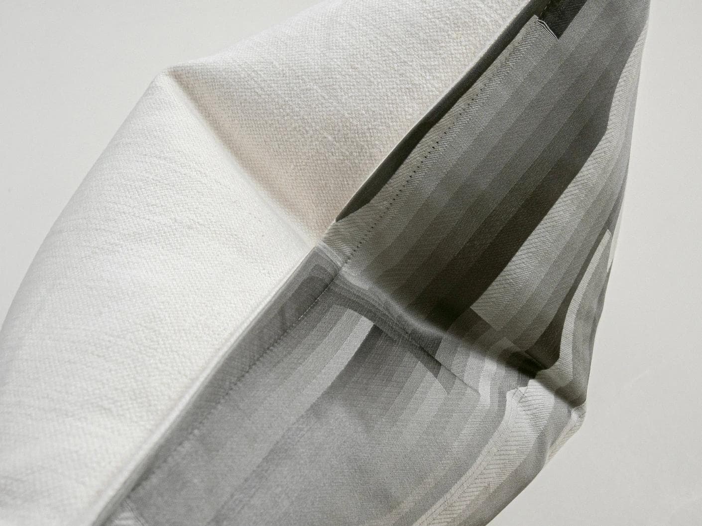 Claudine Laurent cushion in grey, shown in a product close-up as image 6