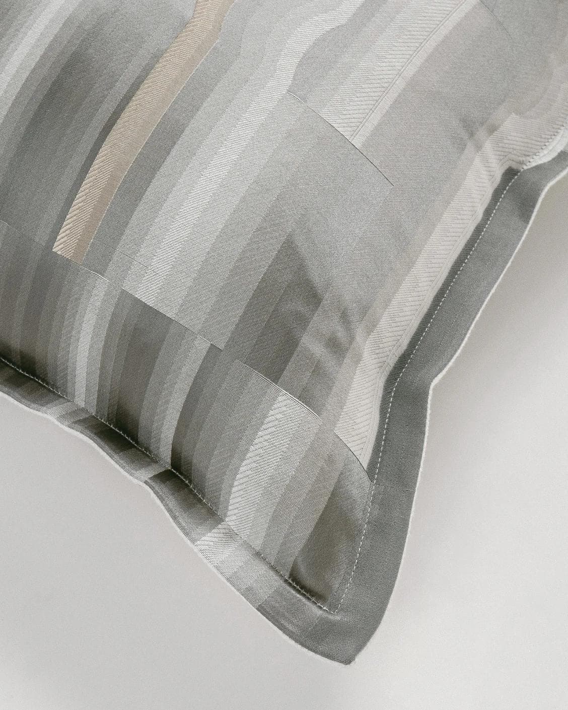 Claudine Laurent cushion in grey, shown in a product top view as image 8