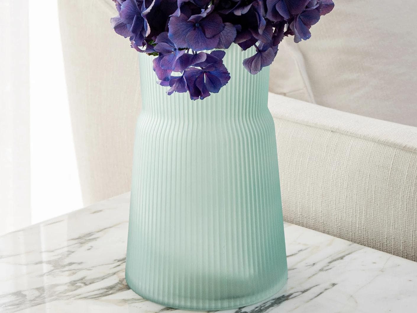 Cloris Storms vases in turquoise, shown in a lifestyle front view as image 5