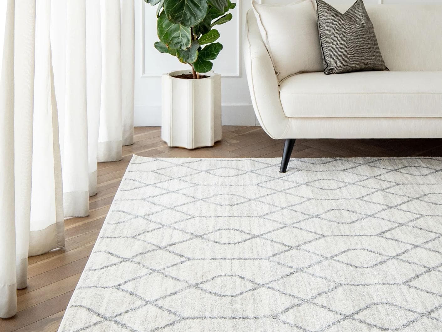 Conrad Lily carpet in ivory and grey, shown in a lifestyle front view as image 4