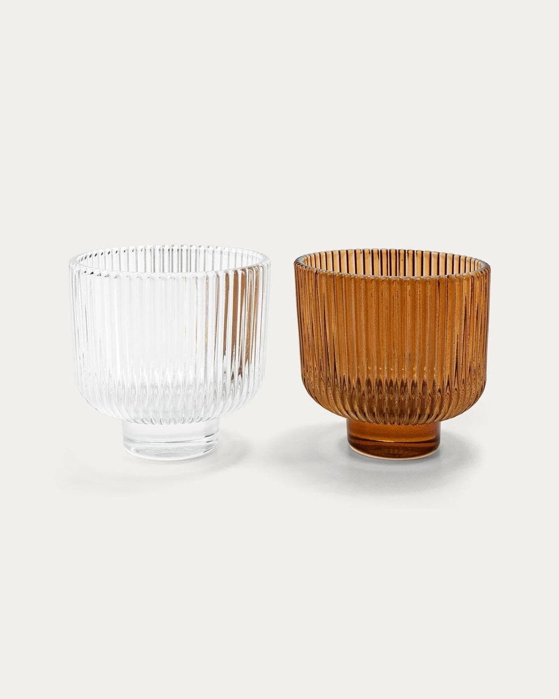 Crista Bundle candle holders in brown and translucent, shown in a product front view as image 1