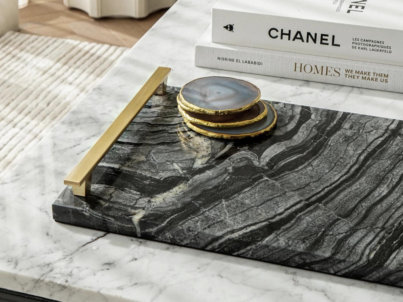 Daniel Bandiagara trays in gold and black, shown in a lifestyle top view as image 2