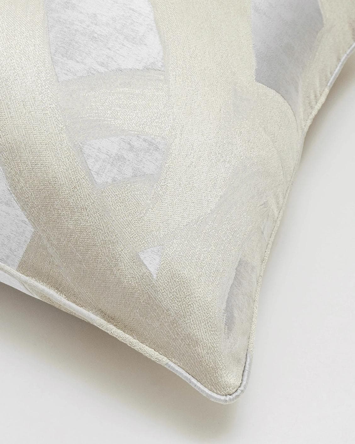 Danya Laurent cushion in silver and beige, shown in a product top view as image 6