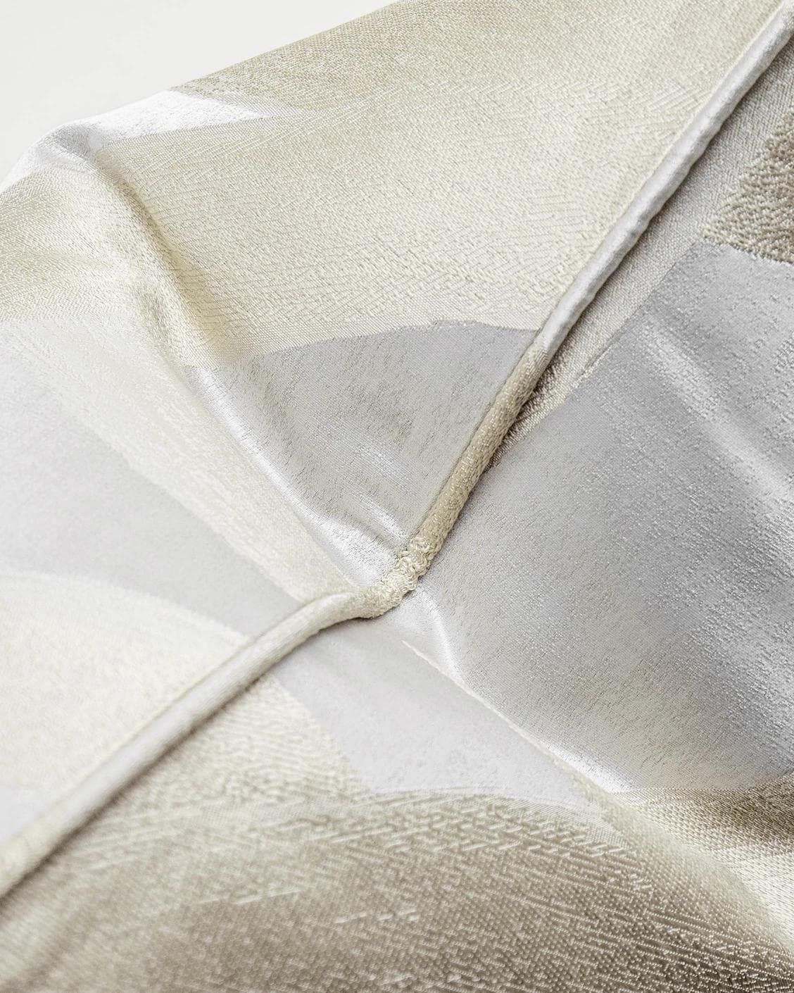 Danya Laurent cushion in silver and beige, shown in a product top view as image 7