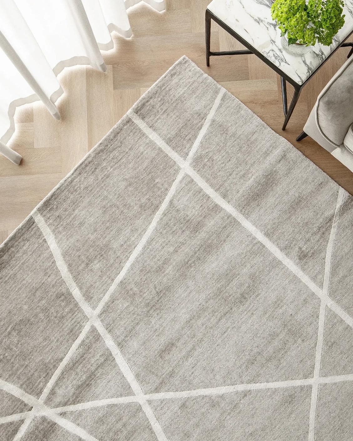 Dash Alba carpet in grey and ivory, shown in a lifestyle top view as image 2