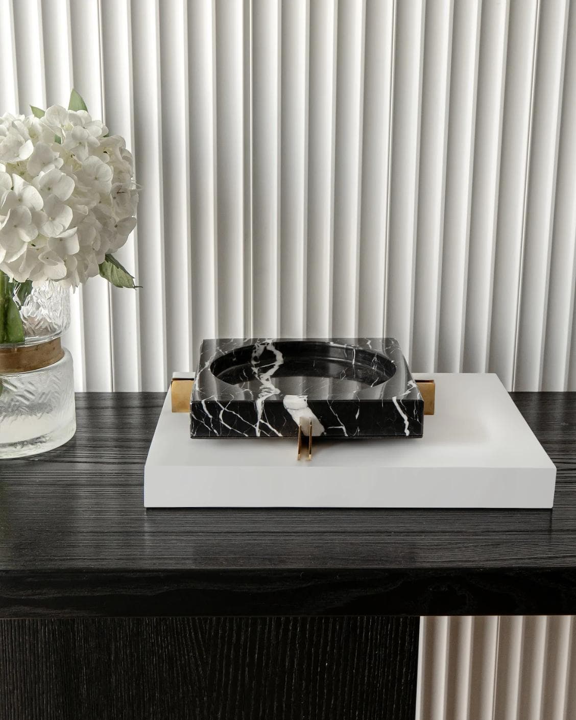 Dennis Bandiagara III trays in black and gold, shown in a lifestyle front view as image 4