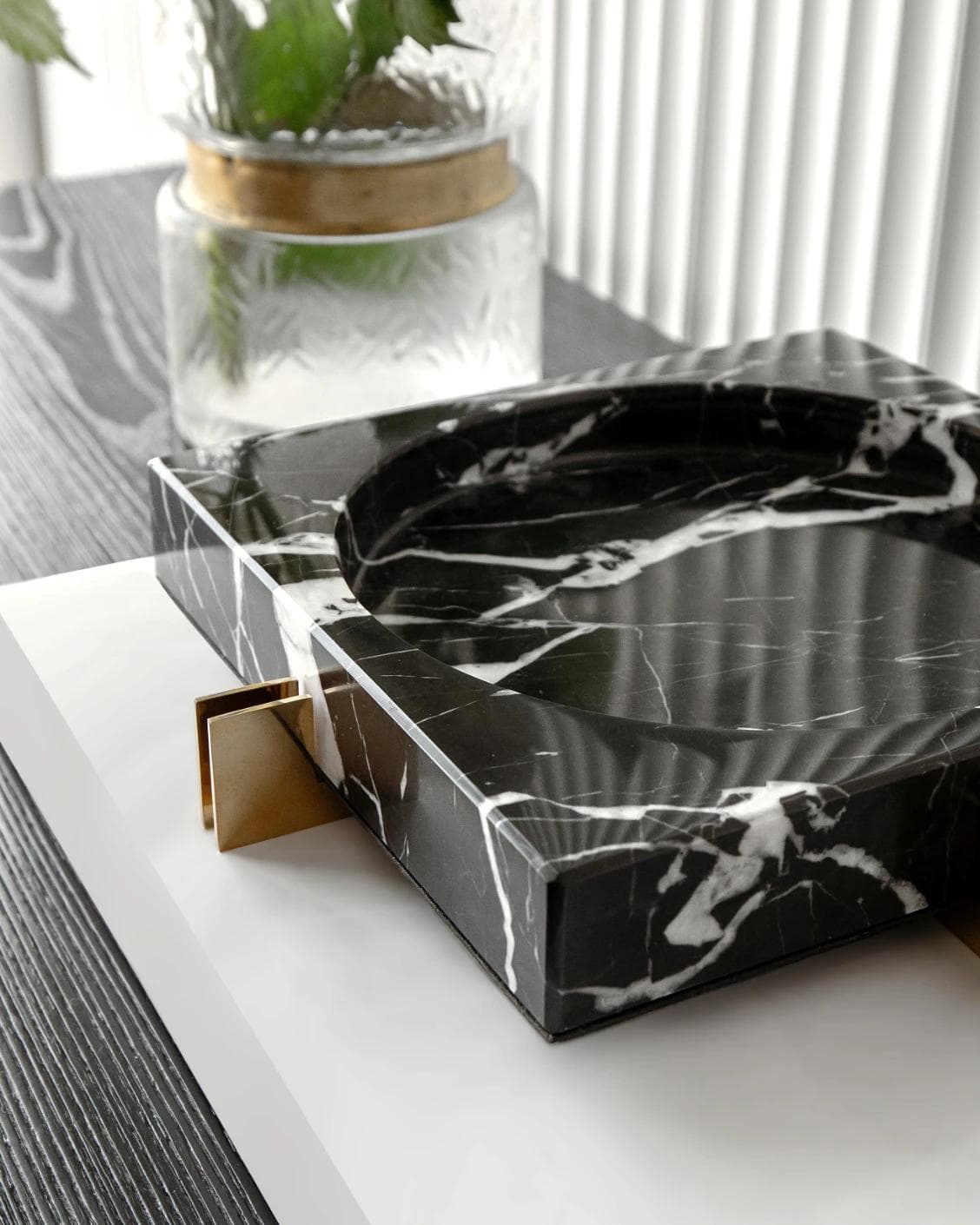 Dennis Bandiagara III trays in black and gold, shown in a lifestyle right view as image 5