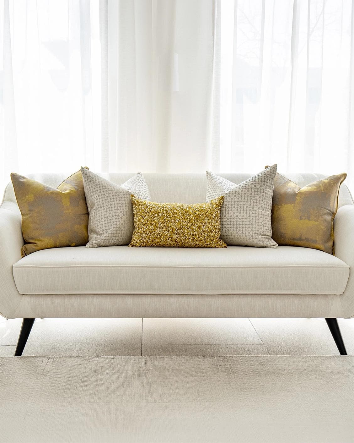Ivan Bundle cushion in gold and silver, shown in a product front view as image 5