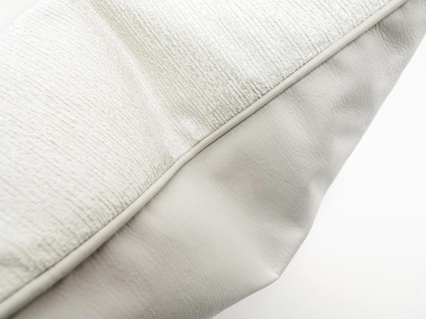 Divina Bianca cushion in white, shown in a product close-up as image 7