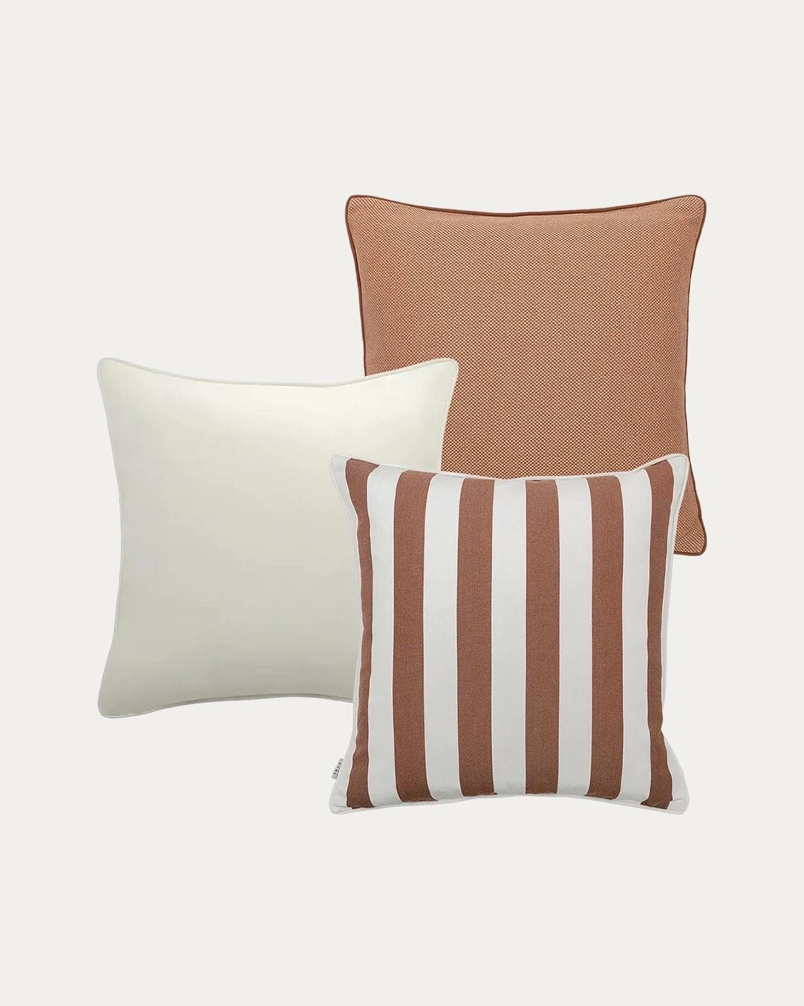 Donya Bundle outdoor bundles in ivory and rust, shown in a product as image 1