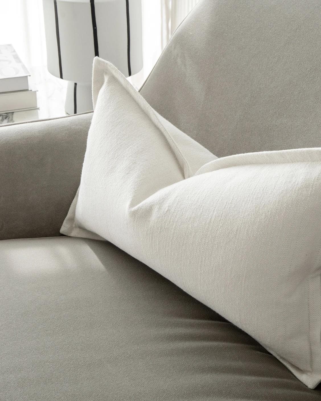 Dorothy Bianca II cushion in white, shown in a lifestyle right view as image 5