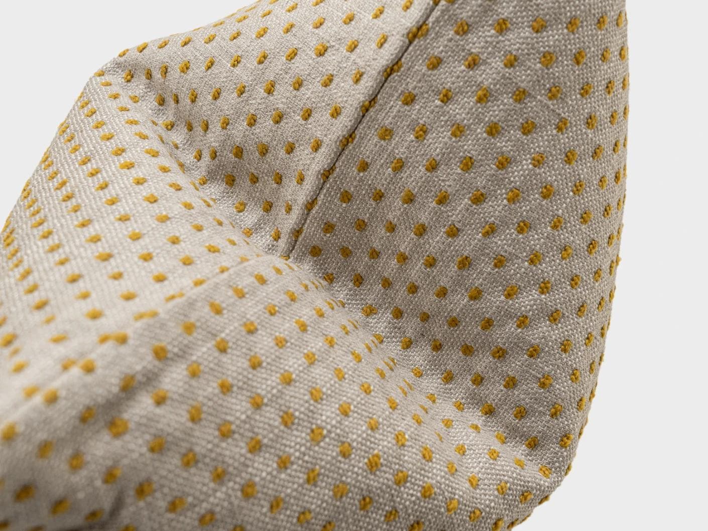Dotty Barrymore cushion in beige, shown in a product close-up as image 7