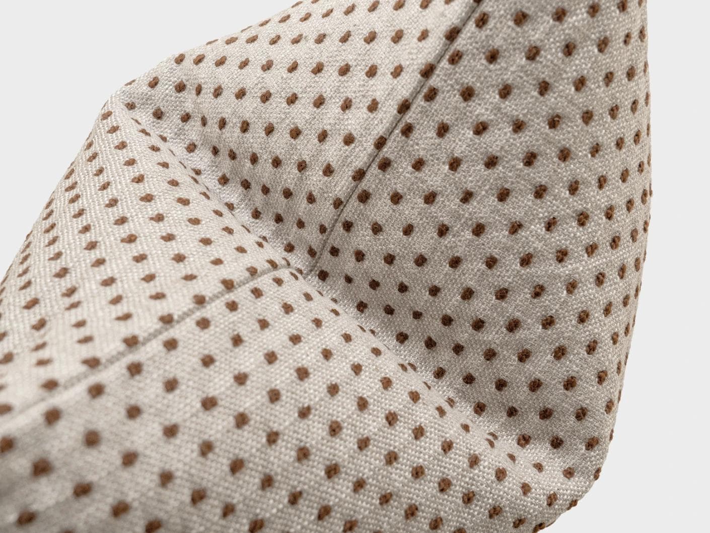 Dotty Rust cushion in beige, shown in a product top view as image 10