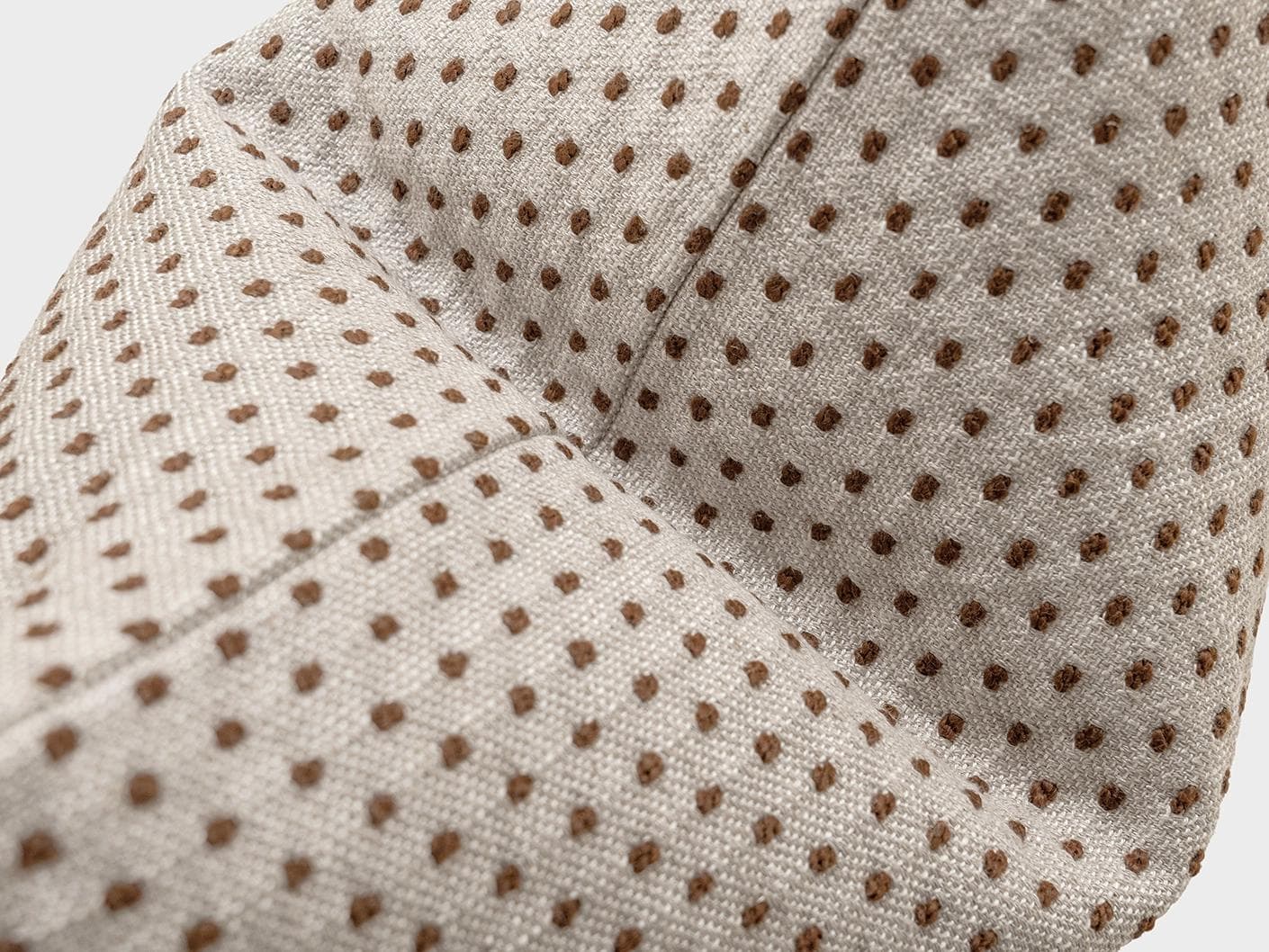 Dotty Rust III cushion in beige and grey, shown in a product close-up top view as image 6