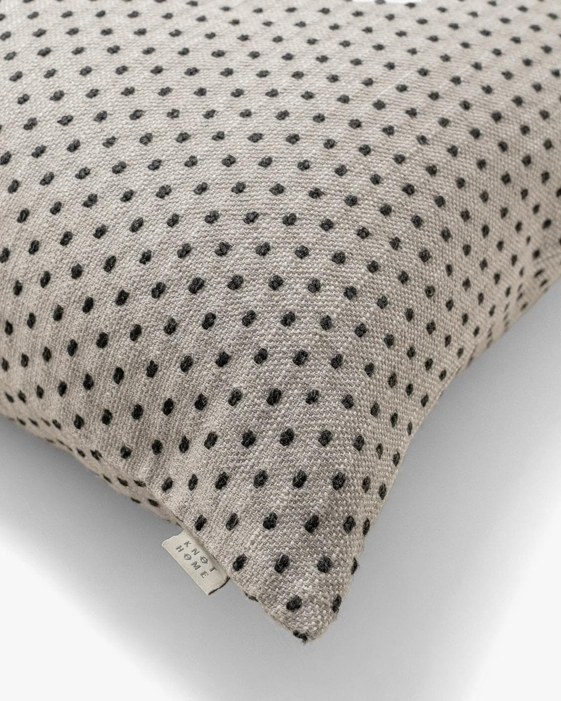 Dotty Steele cushion in grey, shown in a product top view as image 11