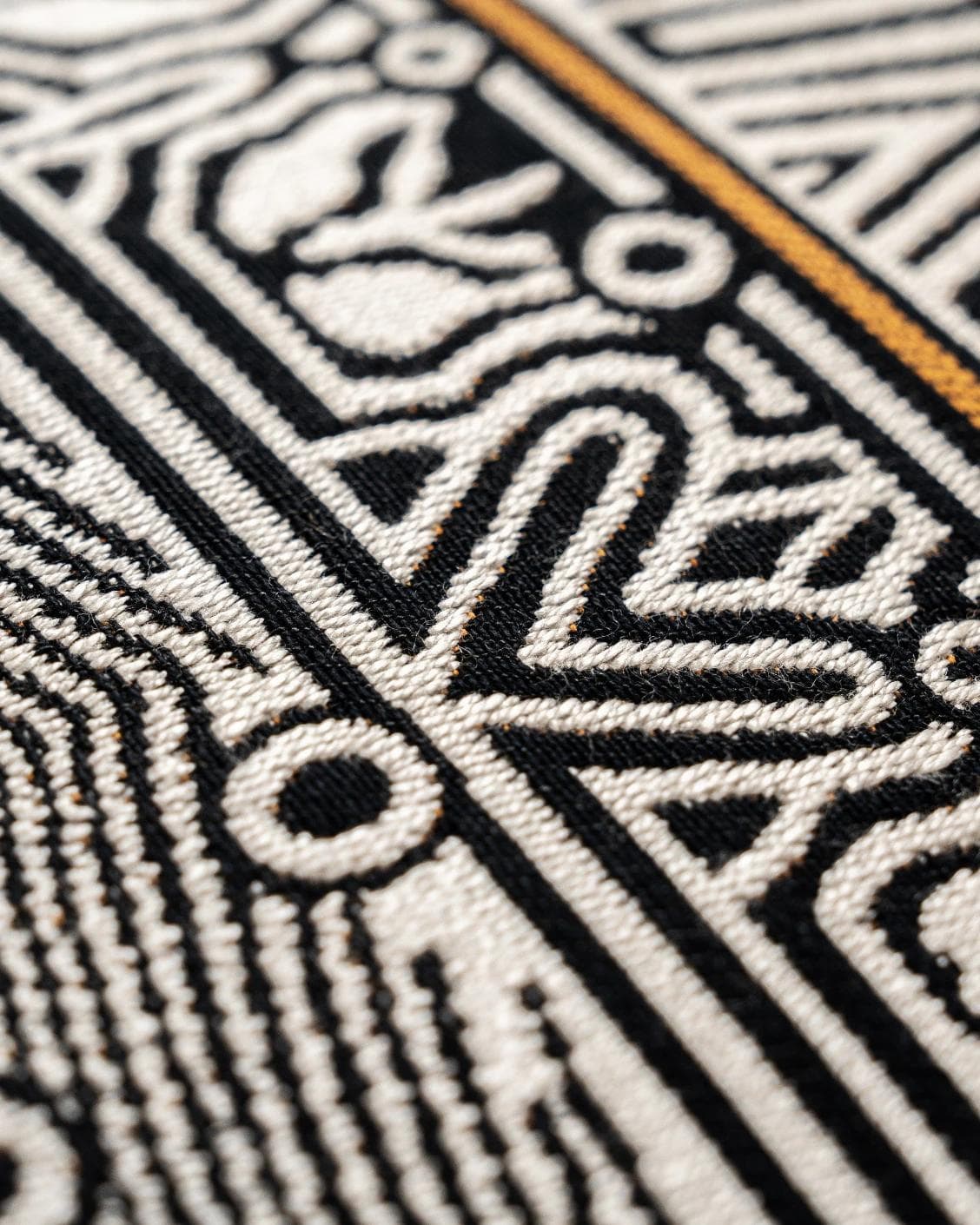 Edda Hodler cushion in black and silver, shown in a product close-up as image 6