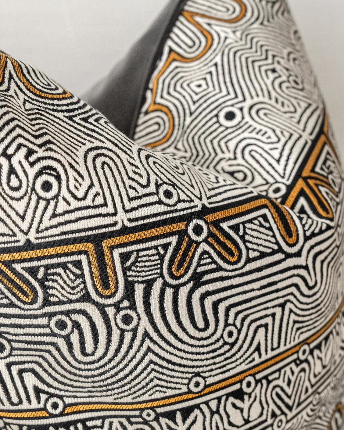 Edda Hodler cushion in black and silver, shown in a product close-up as image 7