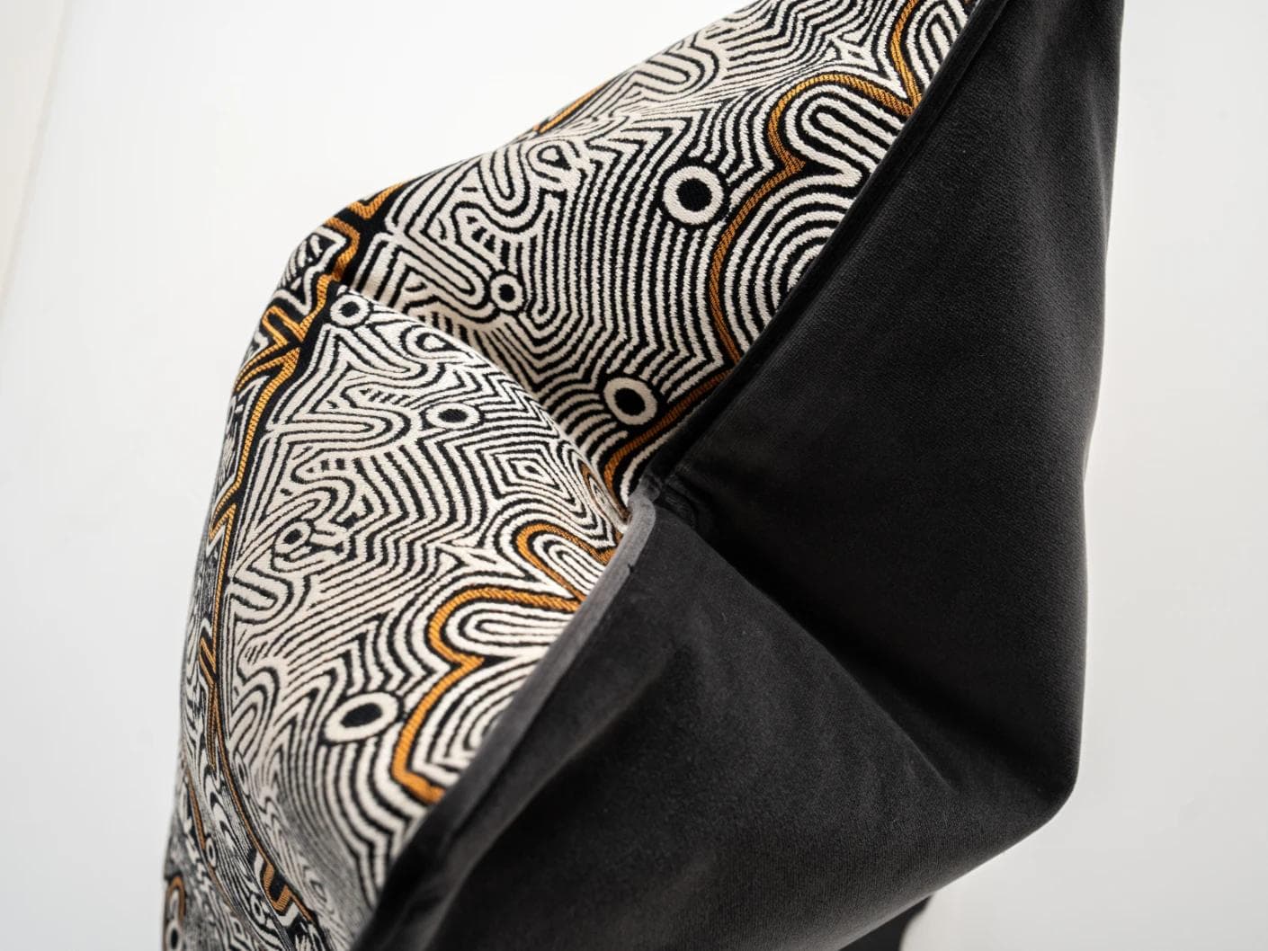 Edda Hodler cushion in black and silver, shown in a product top view as image 2