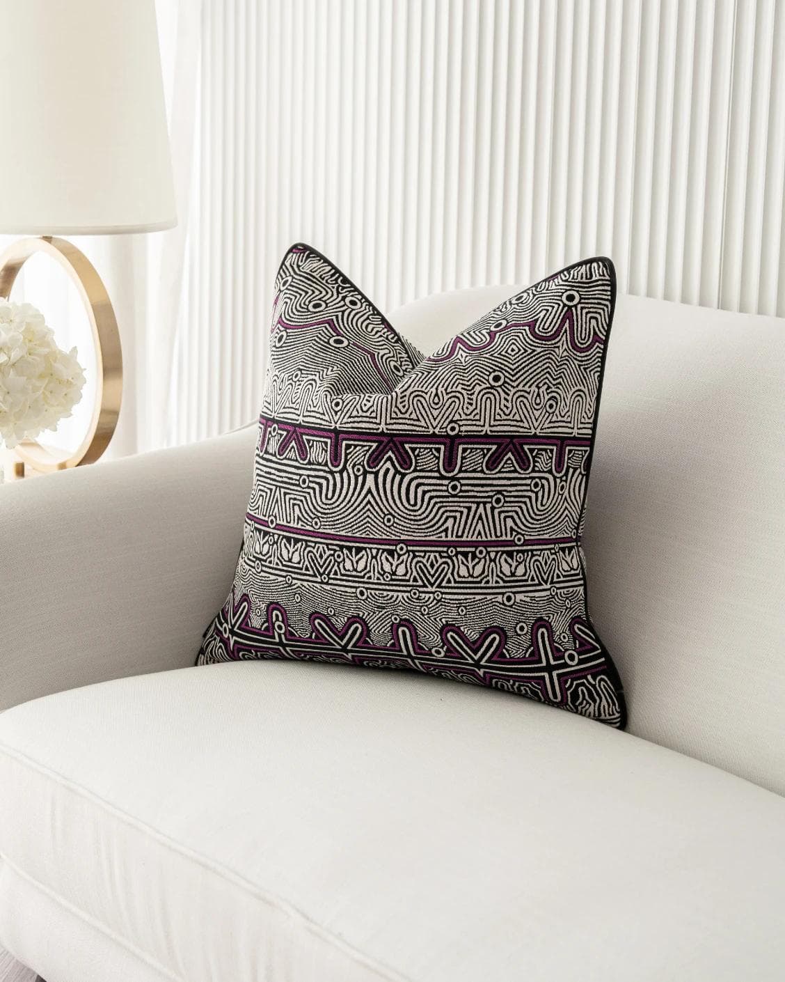 Edda Mauve cushion in black and silver, shown in a lifestyle front view as image 5