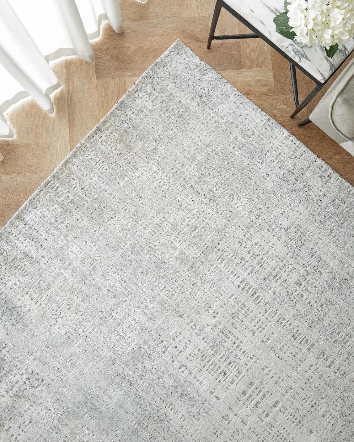Eh Dillan Ocean carpet in blue, shown in a lifestyle top view as image 2