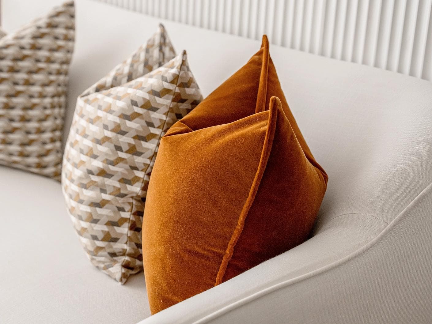Elda Bundle cushion in rust, shown in a product right view as image 7